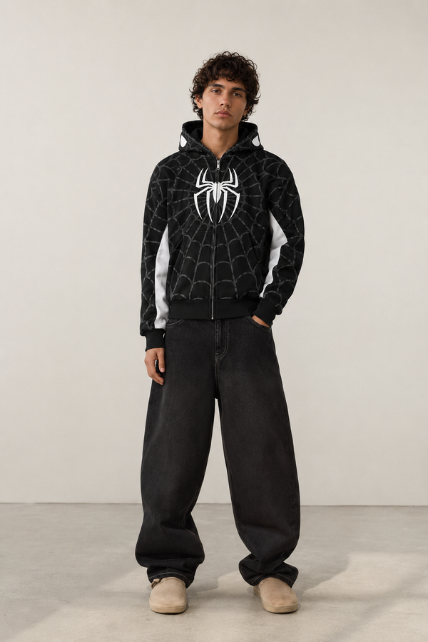 Nostalgic Misfits Noir Zip black white spidey hoodie front view male model baggy black jeans beige sneakers spidey eyes visible on hood y2k streetwear style