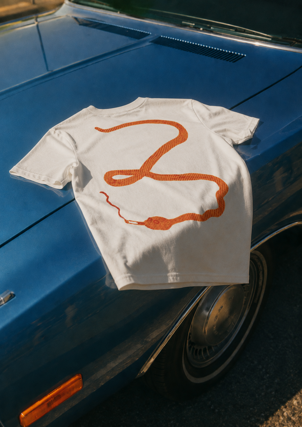 Back of BISHOP white tee - orange snake graphic, EUPHORIC collection by Nostalgic Misfits