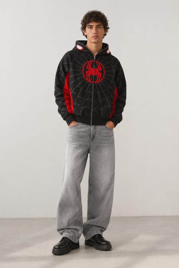 Nostalgic Misfits Miles Zip black red spidey hoodie front view model wearing baggy grey jeans red spider logo in circle on chest spidey eyes visible on open hood y2k streetwear style