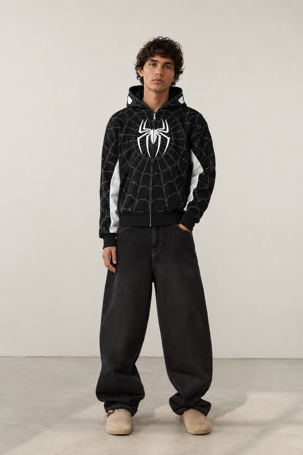 Nostalgic Misfits Noir Zip black white spidey hoodie front view male model baggy black jeans beige sneakers spidey eyes visible on hood y2k streetwear style