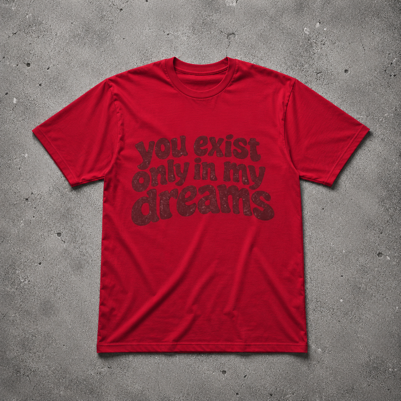 You Exist Only In My Dreams Tee red oversized vintage 
graphic t-shirt flat lay on concrete — retro bubble letter 
screen print, Nostalgic Misfits limited edition streetwear