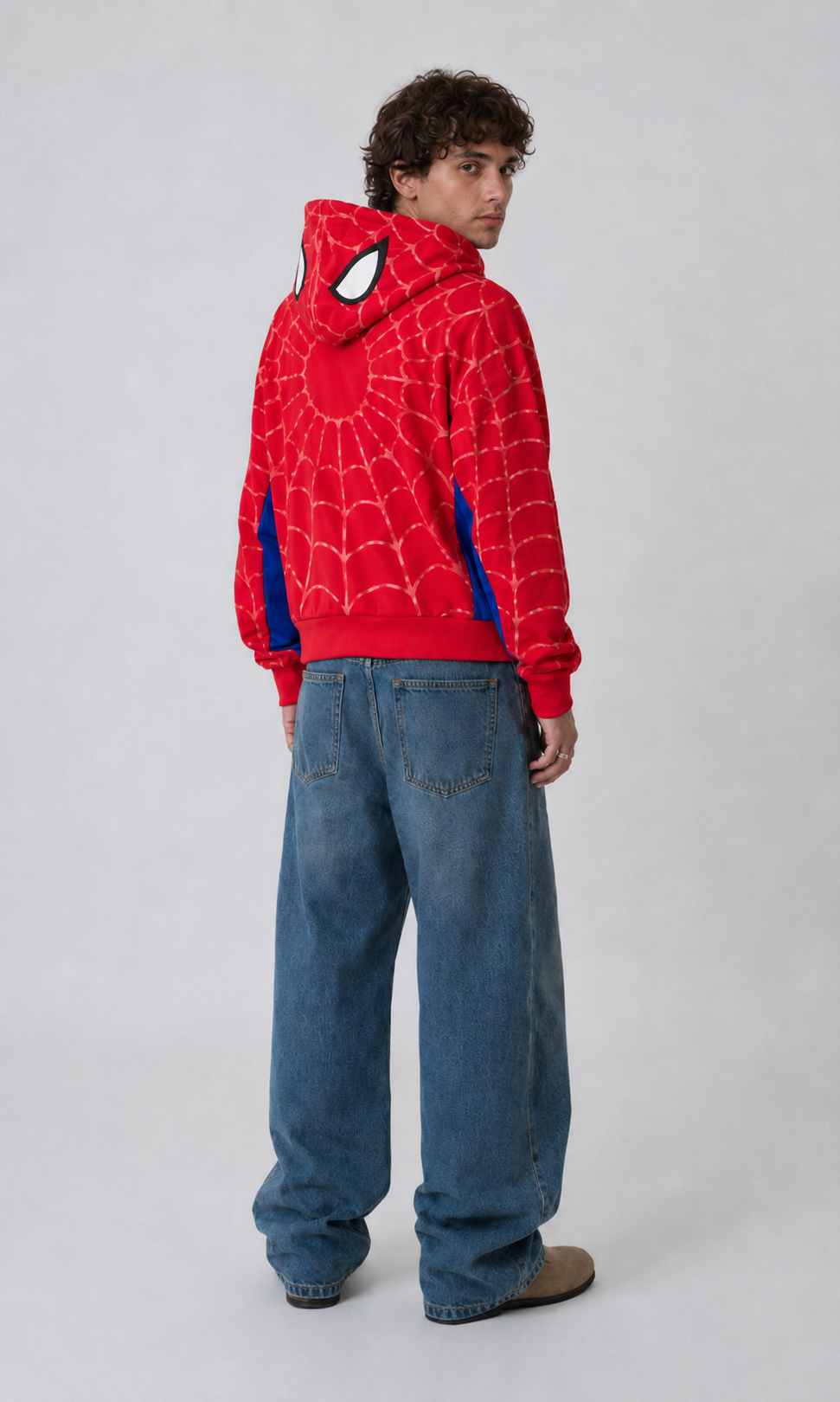 ZDJECIA

Nostalgic Misfits OG Zip red spidey hoodie back view model wearing baggy denim jeans studio shot showing web pattern blue side panels and spidey eyes on hood


