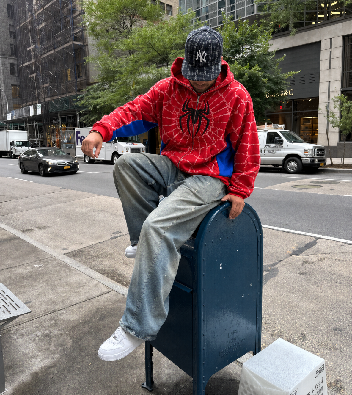 Nostalgic Misfits OG Zip red spidey hoodie street style NYC worn with washed baggy jeans white air force 1 and NY cap sitting on mailbox